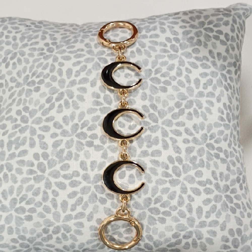 Elegant Gold and Black Crescent Bag Extender
